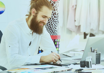 modern fashion designers drawings of fashion in creative Studio