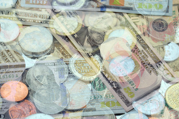 Mixed coins and from many country such as Dollar, Pound, Rupee, Yen and banknote. Double exposure