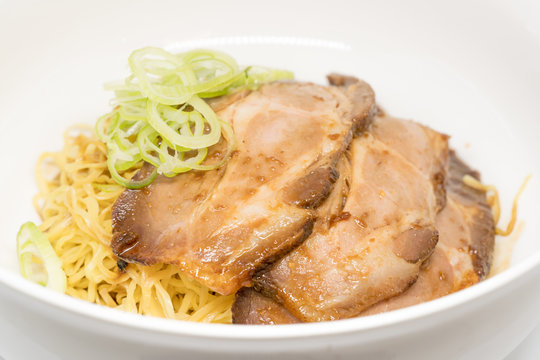 noodle with sweet pork on white background
