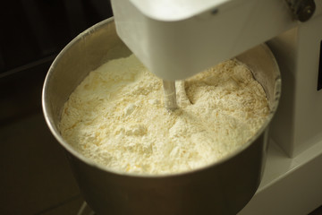professional mixer whips dessert.