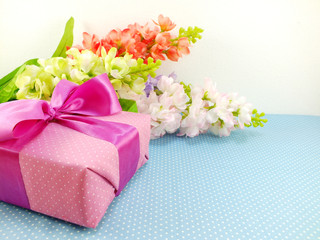 gifts and beautiful bouquet of flowers for mother day birthday or other holiday