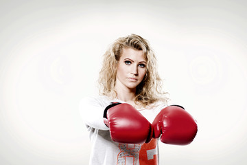 young beautiful woman in Boxing gloves