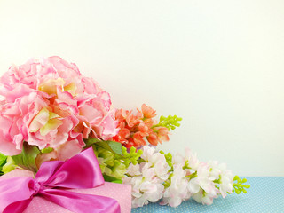 gifts and beautiful bouquet of flowers for mother day birthday or other holiday