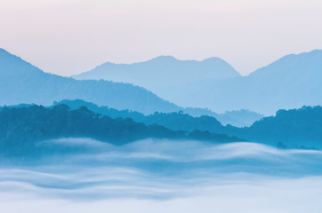 Fototapeta na wymiar soft focus of beautiful scenary of mist with mountain range at P