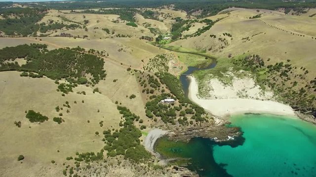 Forward flight from ocean towards Snelling Beach and Middle River. Kangaroo Island, South Australia