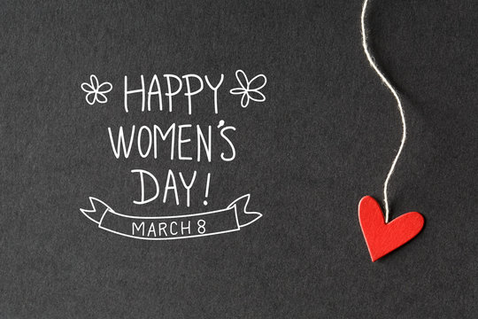 Happy Women's Day message with paper hearts