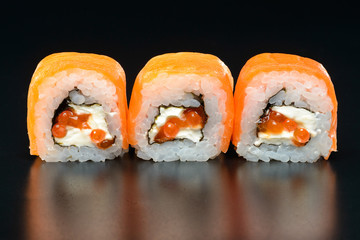 Sushi on black background