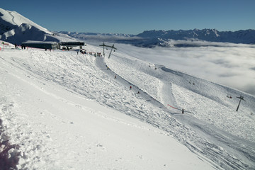 Obraz premium Ski slopes on the southern slope Aibga Ridge of Western Caucasus at Rosa Khutor Alpine Resort