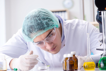 Pharmaceutical industry concept with scientist in the lab