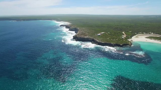 Sweeping cinematic aerial pan across Hanson Bay and rugged ocean coastline.  Kangaroo Island, South Australia