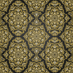 Elegant classic pattern. Seamless abstract background with repeating elements. Black and golden pattern