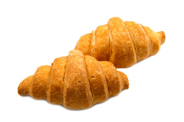Fresh butter croissant, isolated on white background.