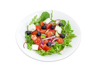 Greek salad in a white dish