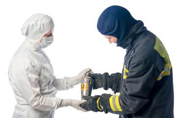Fototapeta premium Fireman sends container with radiation chemist in the laboratory
