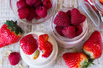 Strawberries and raspberries with a homemade yogurt