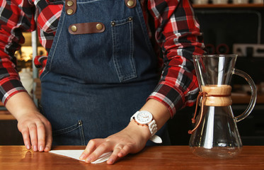 Barista at coffee bar