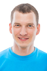 Vertical portrait of a man with a smile on a white background is