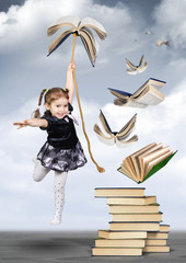 Education creative concept , child girl fly on book