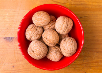 walnuts in red plate