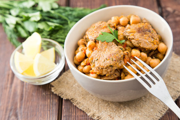 chickpeas with meat with vegetables and greens