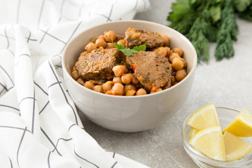 chickpeas with meat with vegetables and greens