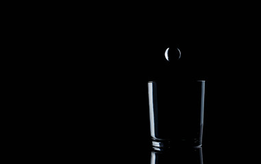 Water in glass with water splash energy