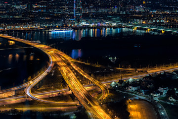 Fototapeta na wymiar Cityscape of Wien by night as seen from Danube Tower