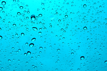 abstract water drop on windshield or water drop on sky backgroun