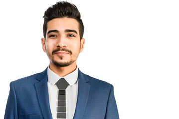 Young attractive man in a blue suit on a white background. Isolated