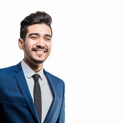 Young attractive man in a blue suit on a white background. Isolated