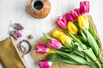 flowers spring tulips top view on wooden background