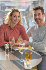 couple in love dating in restaurant