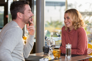 couple in love dating in restaurant