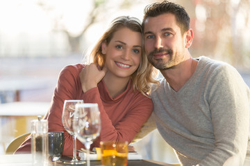 Young couple dating in restaurant