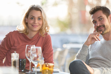 Young couple dating in restaurant