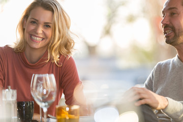 Young couple dating in restaurant