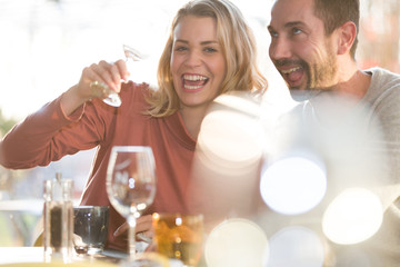 Young couple dating in restaurant
