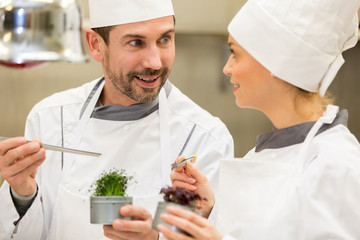 cooks showing aromatics fresh herbs