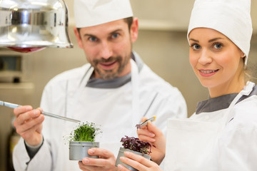 cooks showing aromatics fresh herbs