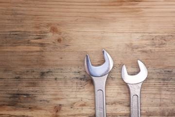 Two wrenches on the wood