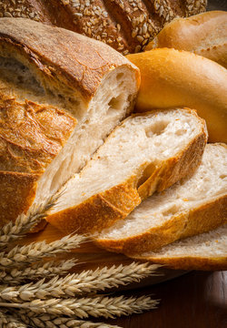 bread and wheat on the wooden