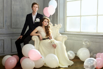 Cute Teenage Prom Couple in beautiful interior - obrazy, fototapety, plakaty