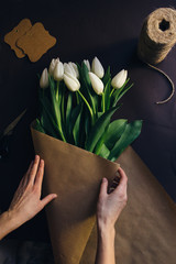 Making white tulips bouquet for Mother's Day