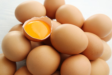 Raw eggs and yolk, closeup