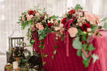 Wedding table decoration on the red cloth
