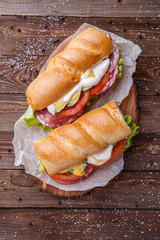 Photography of baguette with sausage