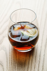 soda with ice cube and lime