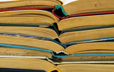 Stack of old open books. Books background
