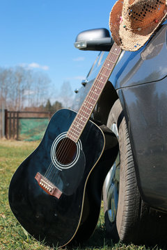 guitar outdoor near car