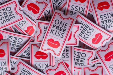 One free kiss on cinema ticket with heart shaped conffeti for Valentine's day